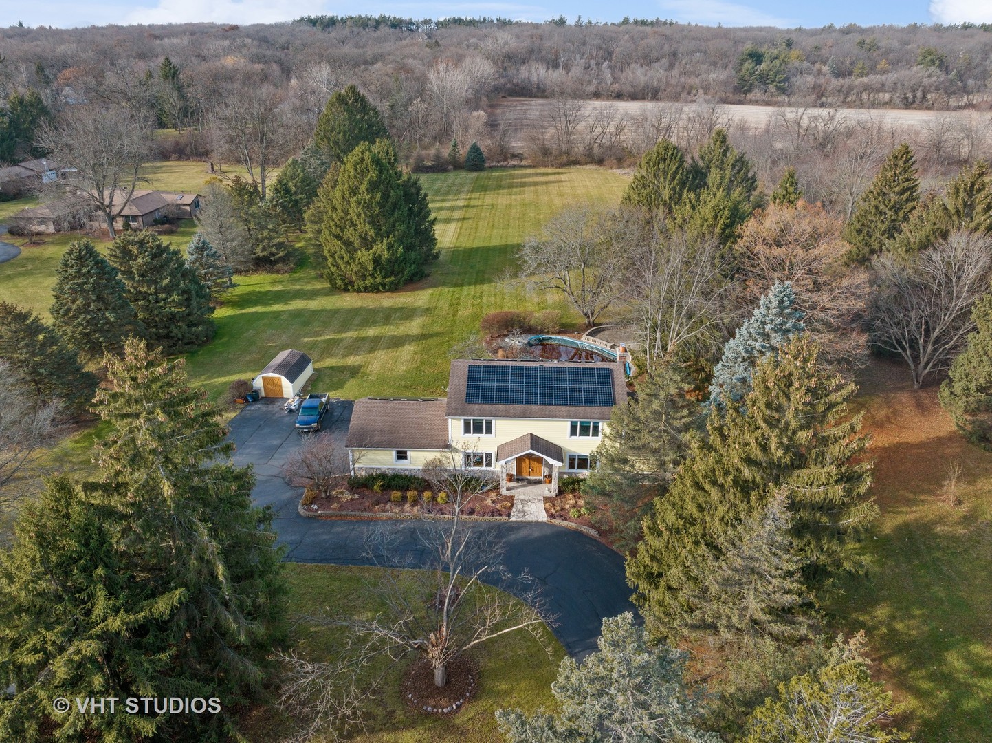 1907 Cherry Valley Road Woodstock, IL 60098 - Photo 53 of 56 a aerial view of a house with a yard