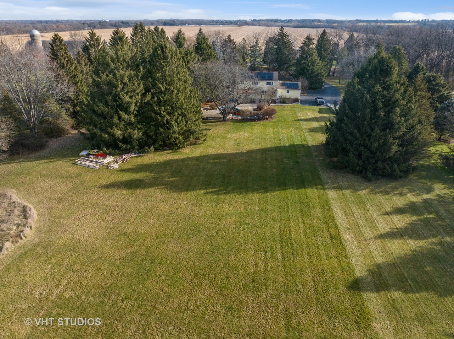 1907 Cherry Valley Road Woodstock, IL 60098 - Photo 56 of 56 a view of swimming pool from a yard