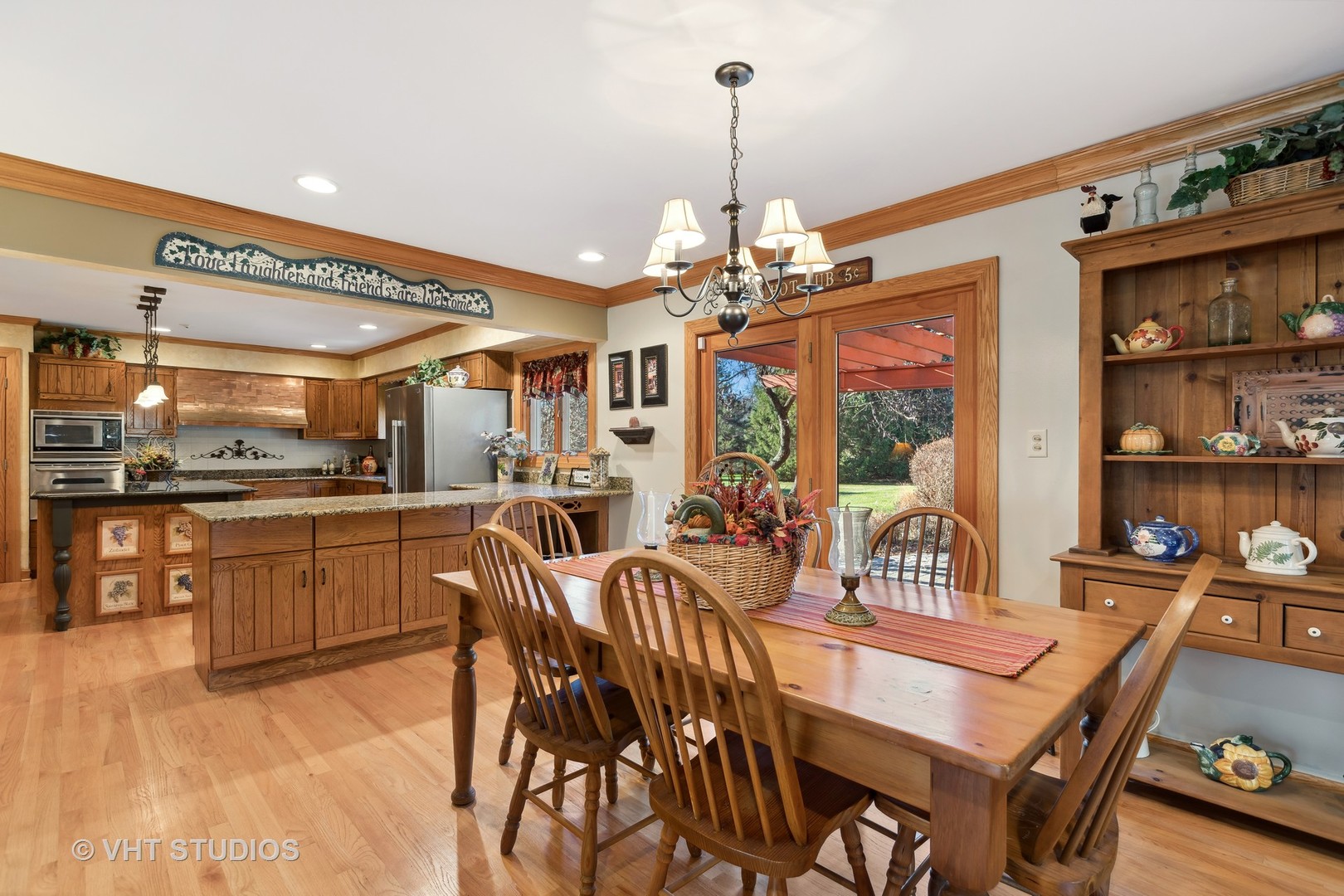 1907 Cherry Valley Road Woodstock, IL 60098 - Photo 6 of 56 a very nice looking dining room with a table and chairs