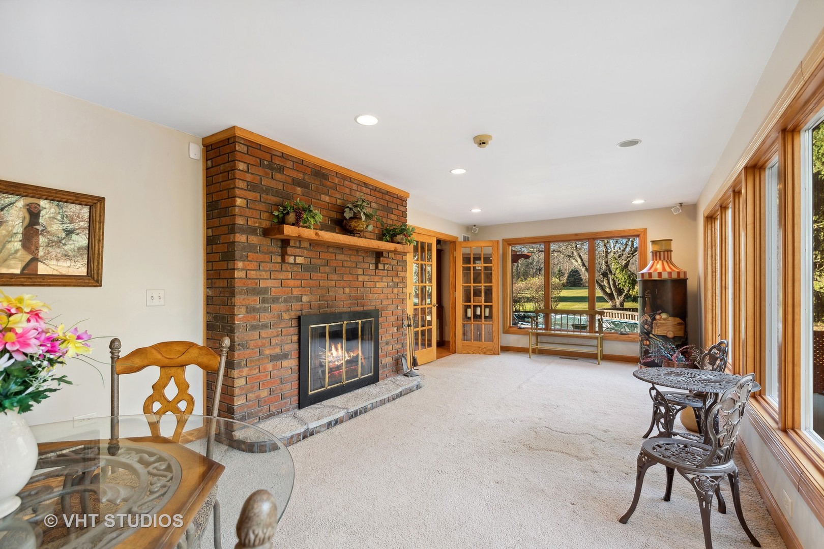 1907 Cherry Valley Road Woodstock, IL 60098 - Photo 9 of 56 a living room with furniture and a fireplace