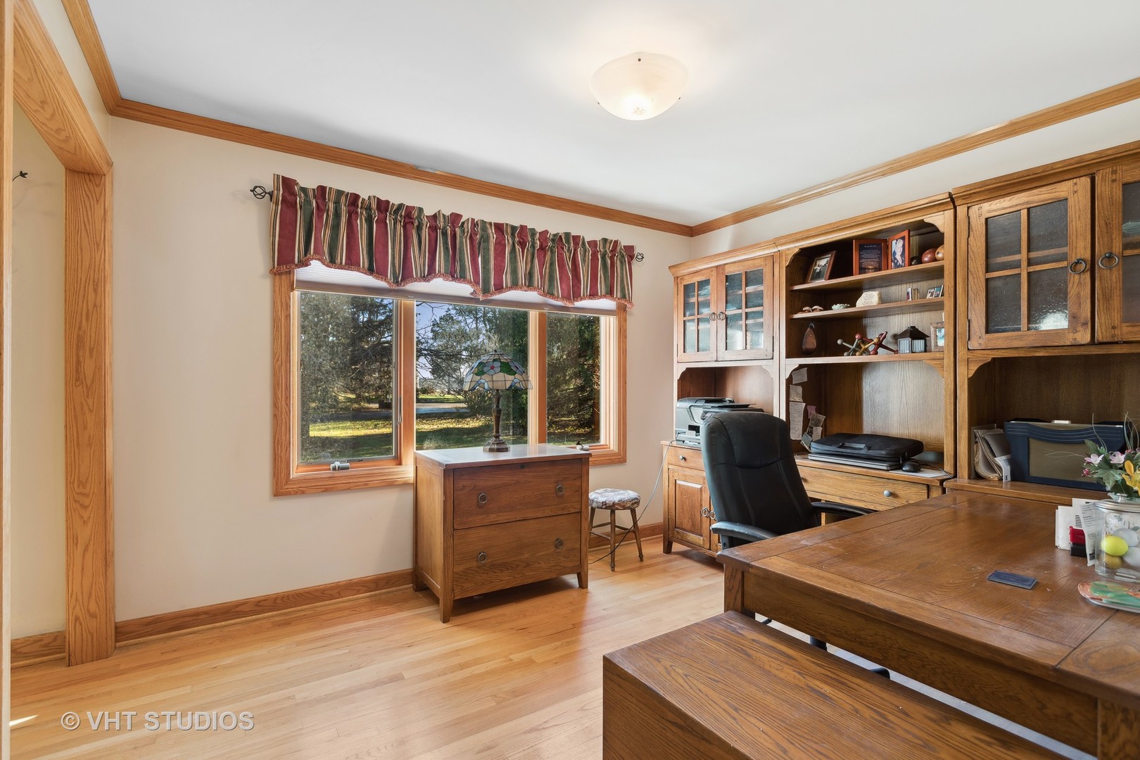 1907 Cherry Valley Road Woodstock, IL 60098 - Photo 10 of 56 a room with furniture and a window