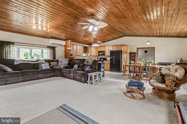 a room with gym equipment and a large window