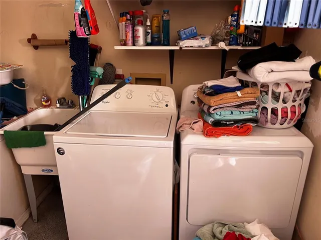 a utility room with dryer and washer