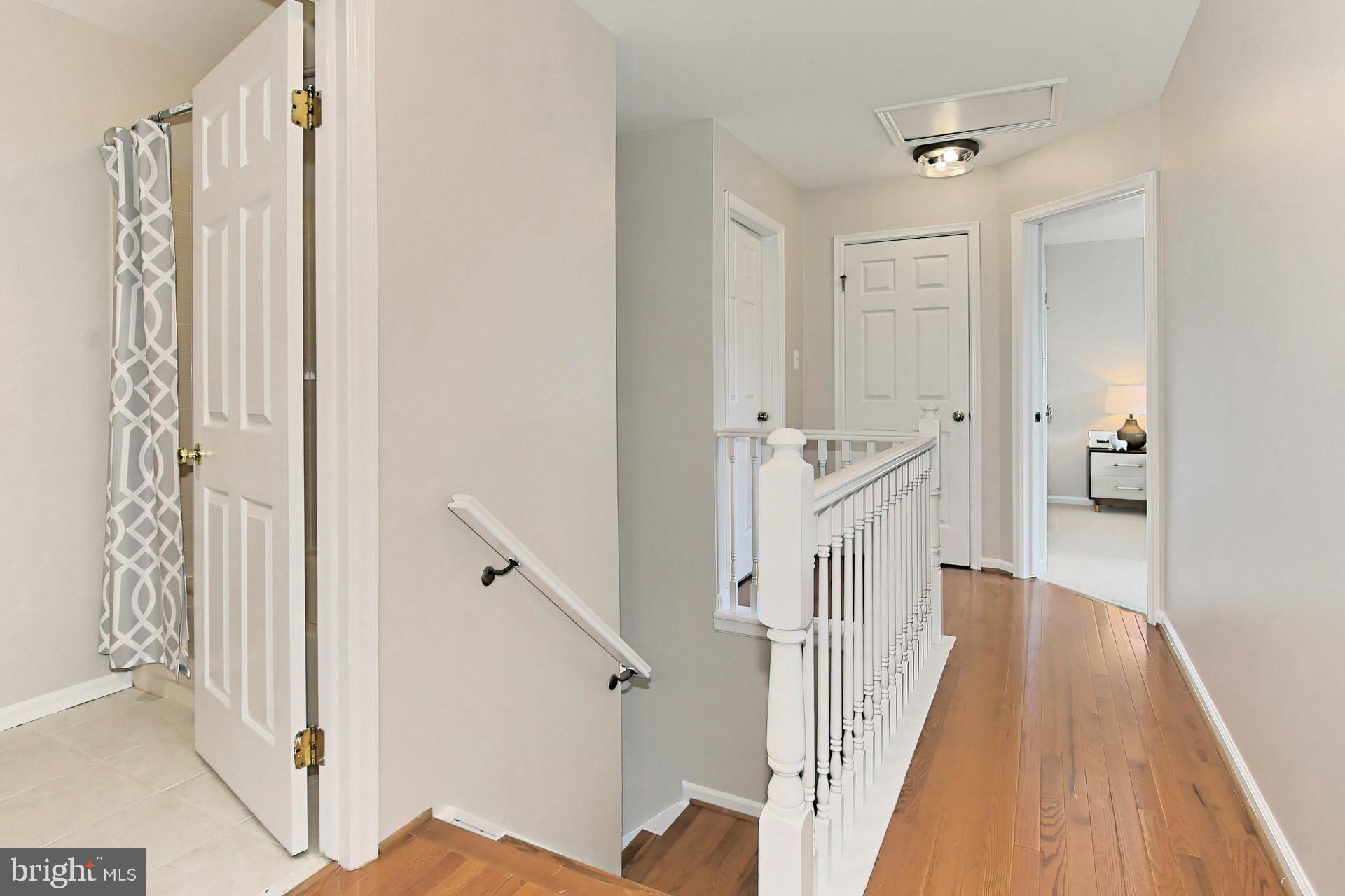 12567 Rock Ridge Road Herndon, VA 20170 - Photo 25 of 50 Upper Foyer w Hardwood Flooring + New Lighting