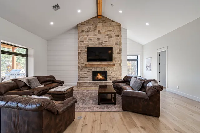 a view of a balcony with a table and chairs