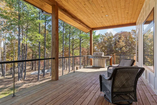 a bathroom with a glass door shower