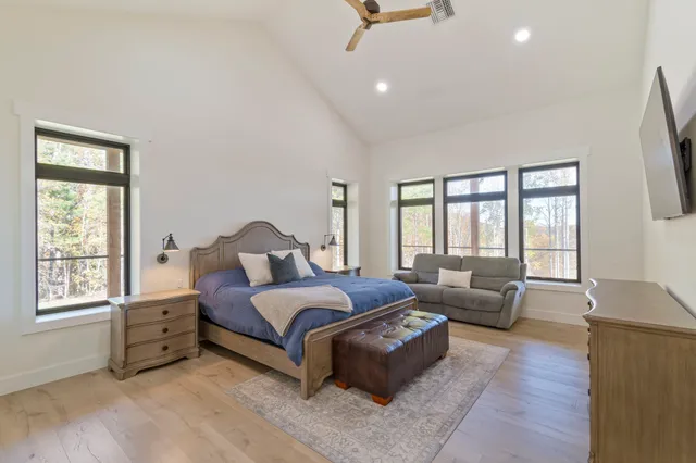 a living room with a couch and a flat screen tv