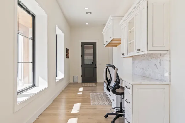 a view of house with a yard