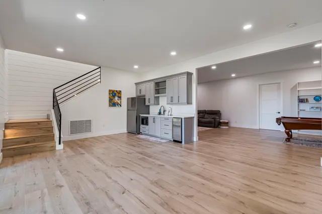 an aerial view of a house with yard and outdoor space