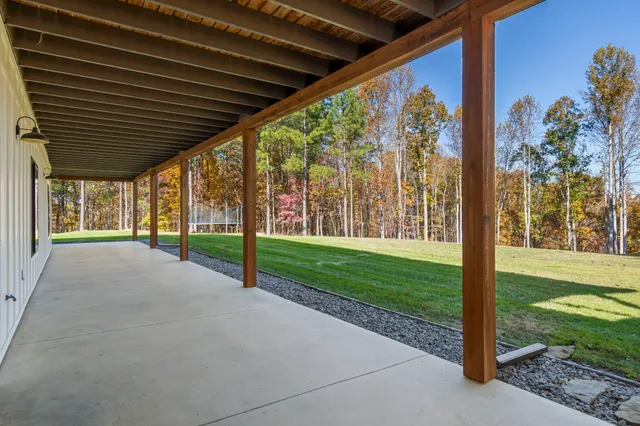 a view of a city with lush green forest
