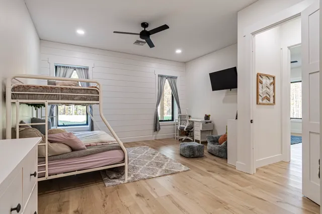 a view of parking area with parked cars