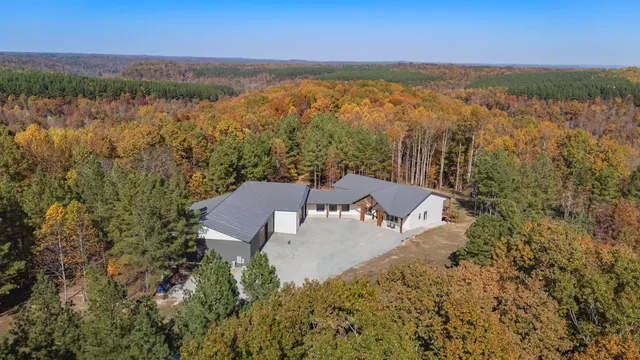 a living room with furniture window and wooden floor