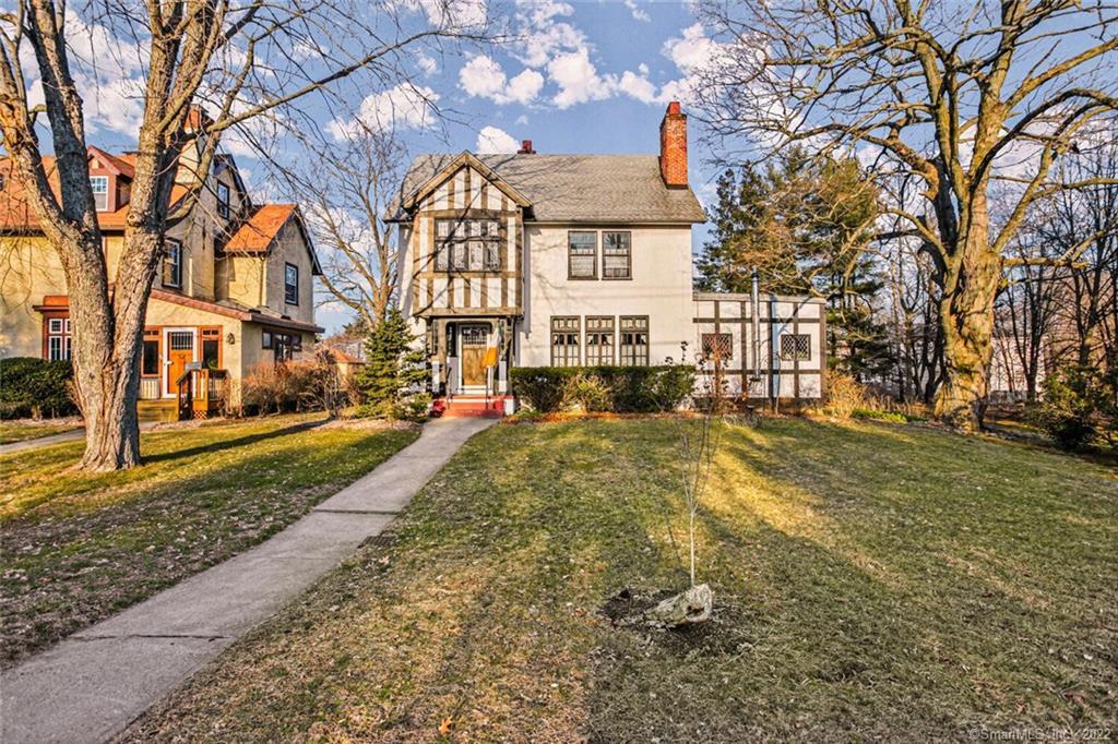 a view of road with large trees