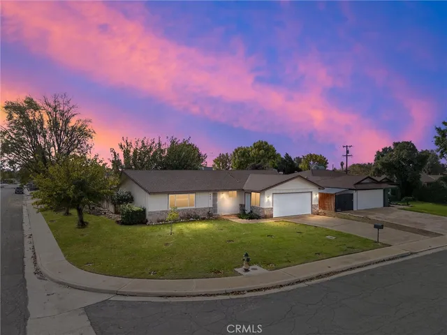 front view of a house with a garden