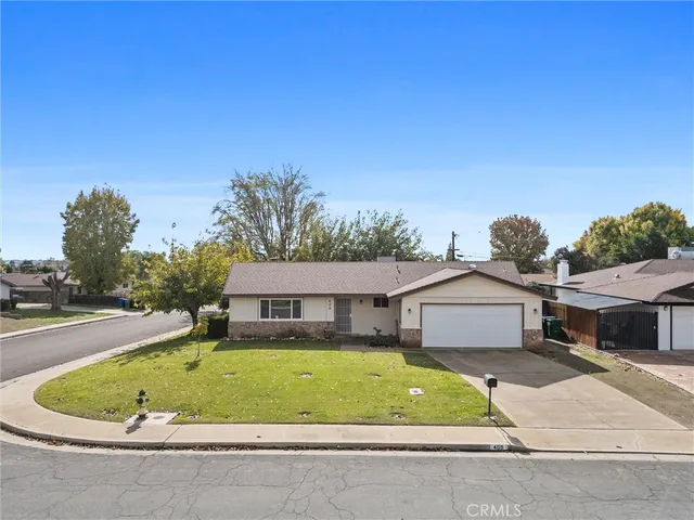 a house with trees in the background