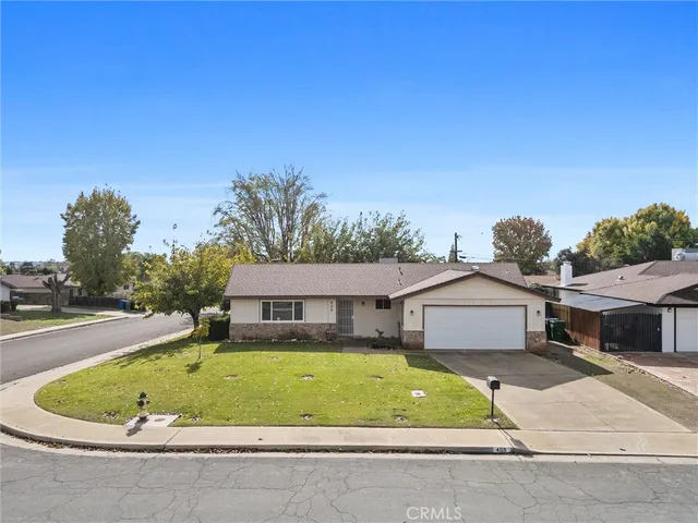 a house with trees in the background