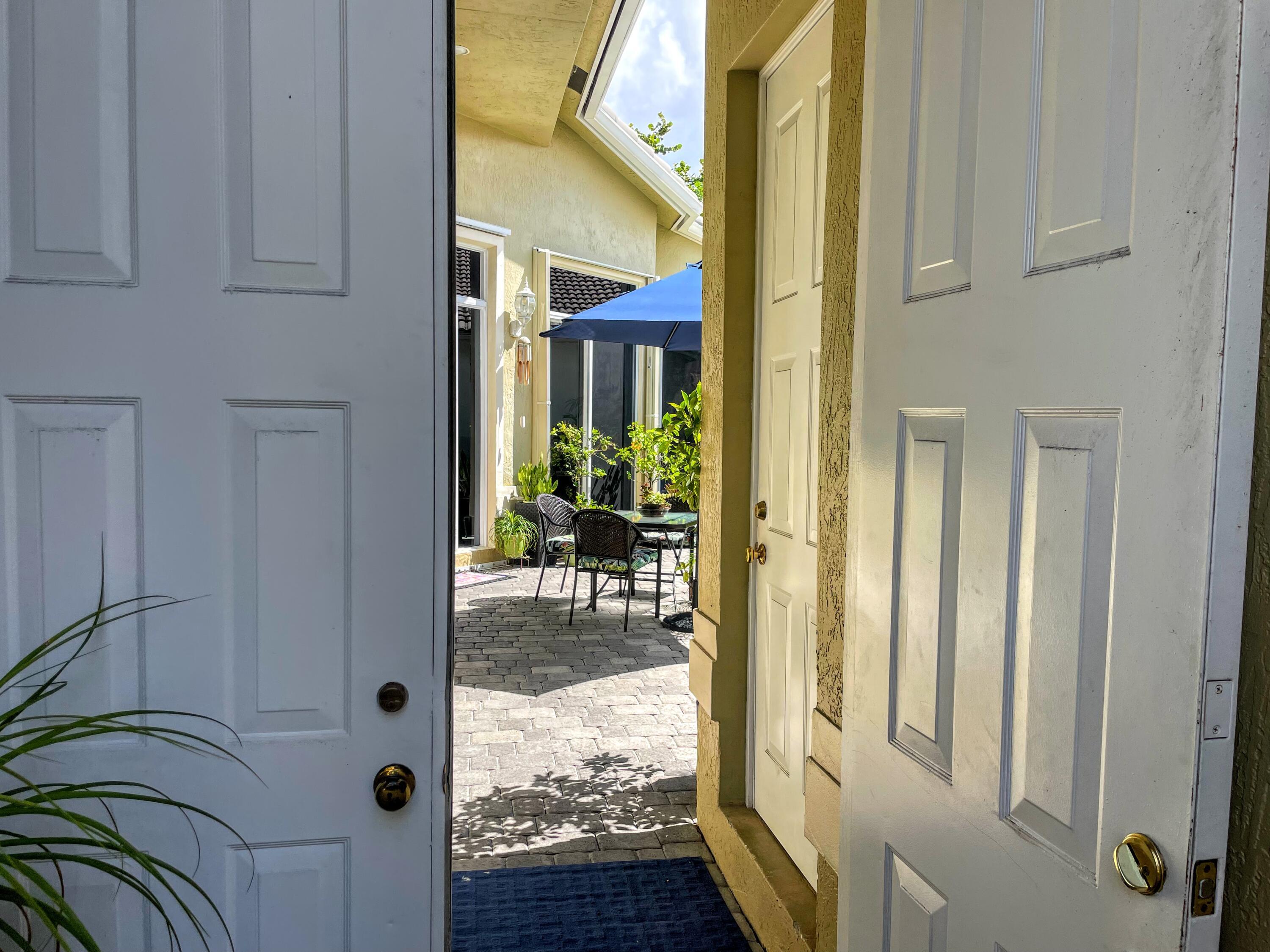 7060 Northwest Turtle Walk Boca Raton, FL 33487 - Photo 7 of 51 Front Door