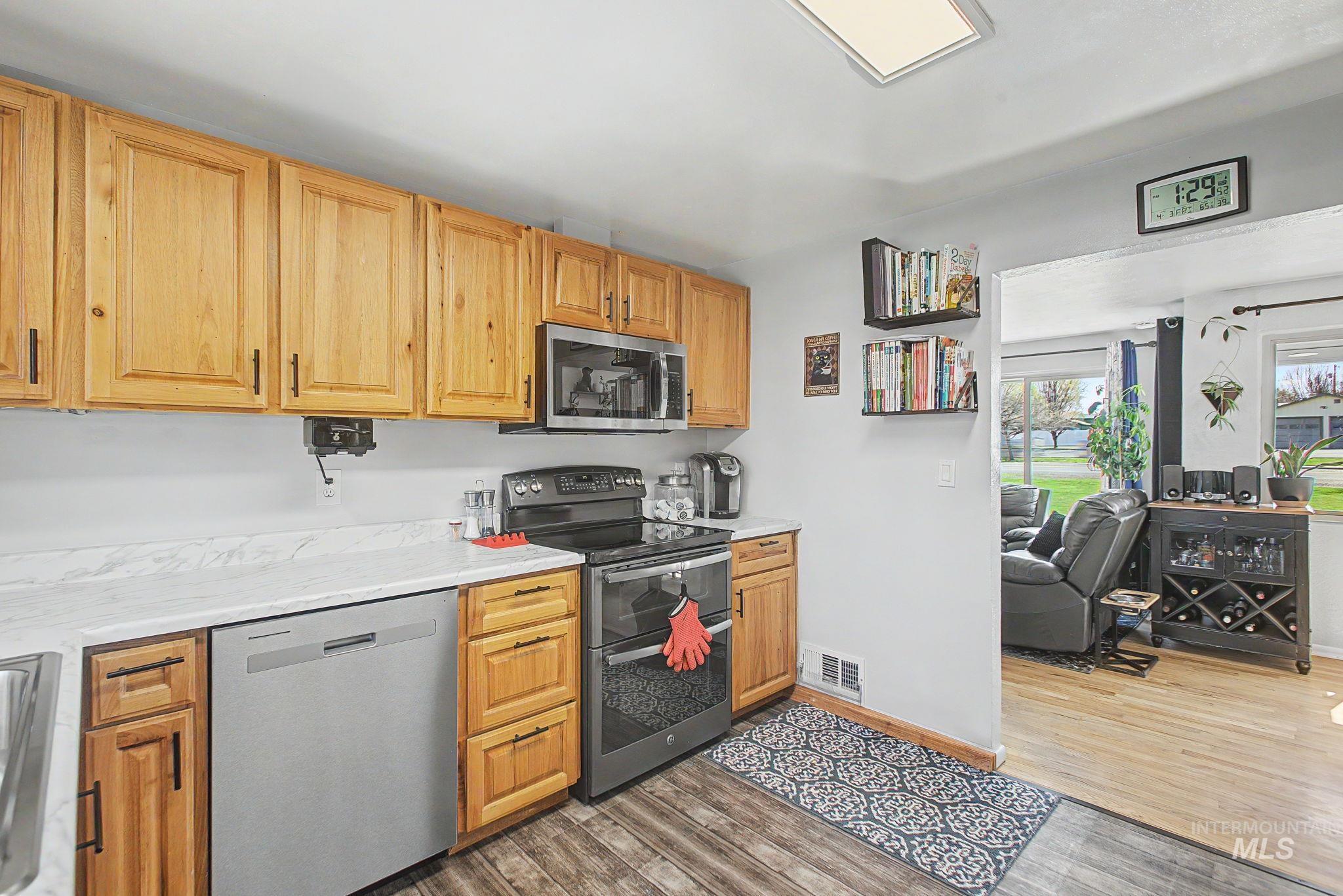 809 Bryden Avenue Lewiston, ID 83501 - Photo 11 of 42 Kitchen featuring stainless steel appliances and light wood-style flooring