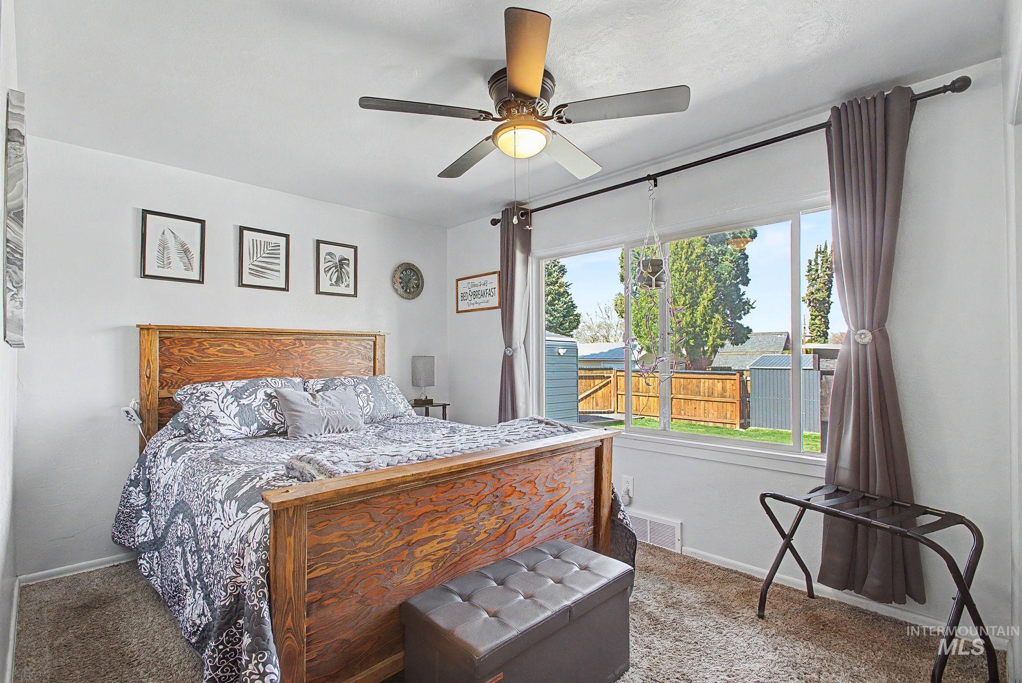 809 Bryden Avenue Lewiston, ID 83501 - Photo 15 of 42 Carpeted bedroom with ceiling fan and baseboards