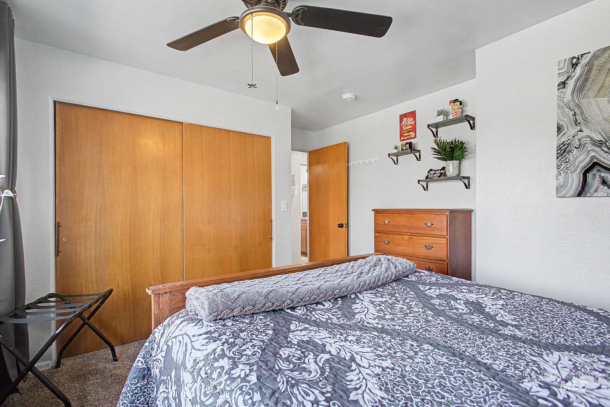 809 Bryden Avenue Lewiston, ID 83501 - Photo 16 of 42 Carpeted bedroom with a closet and a ceiling fan