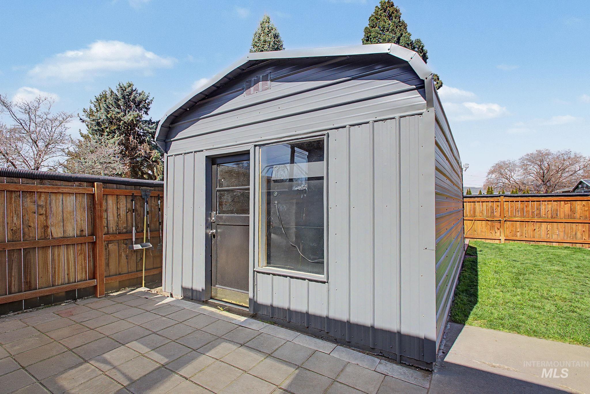 809 Bryden Avenue Lewiston, ID 83501 - Photo 39 of 42 View of outbuilding with a fenced backyard