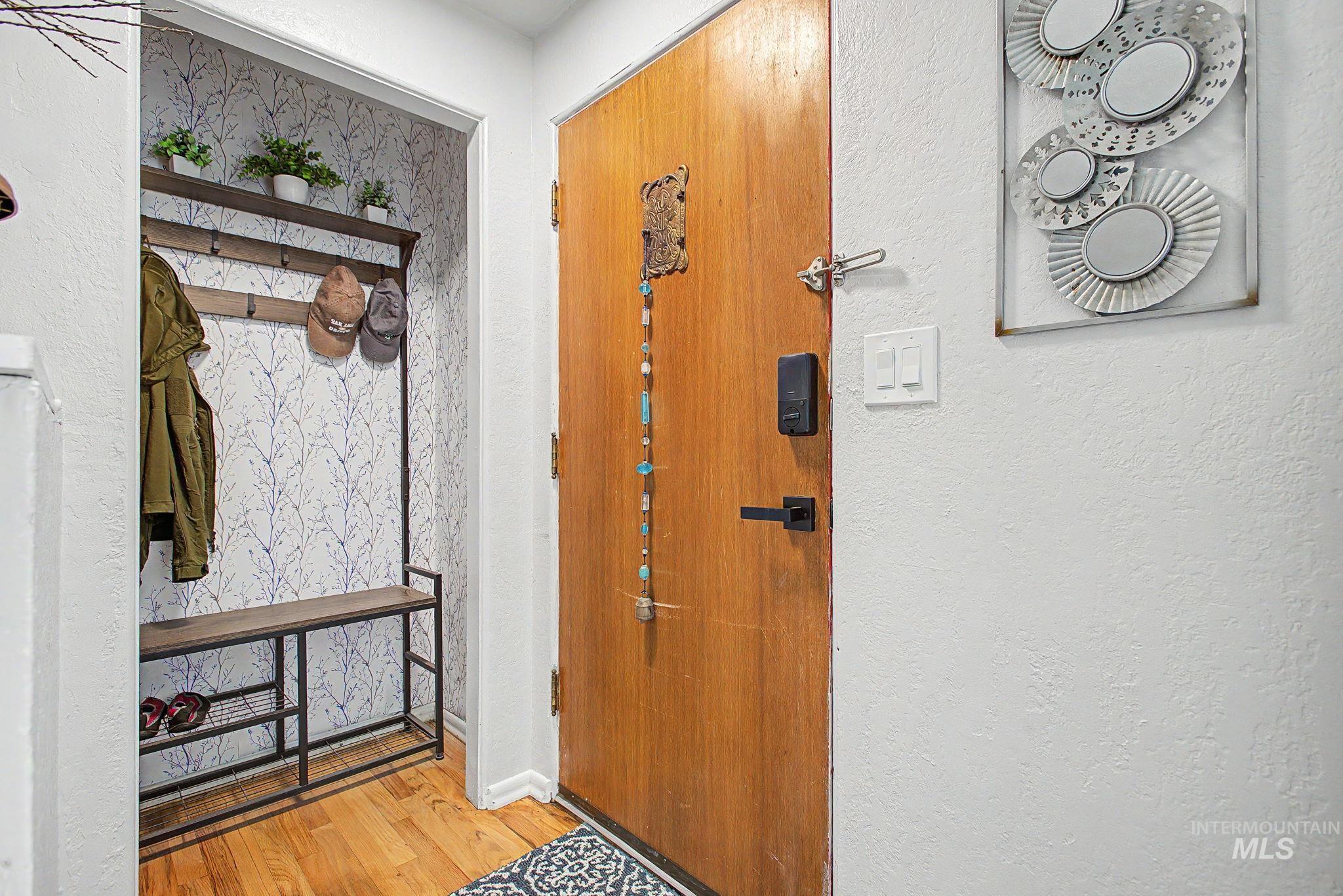 809 Bryden Avenue Lewiston, ID 83501 - Photo 4 of 42 Foyer with light wood finished floors and a textured wall