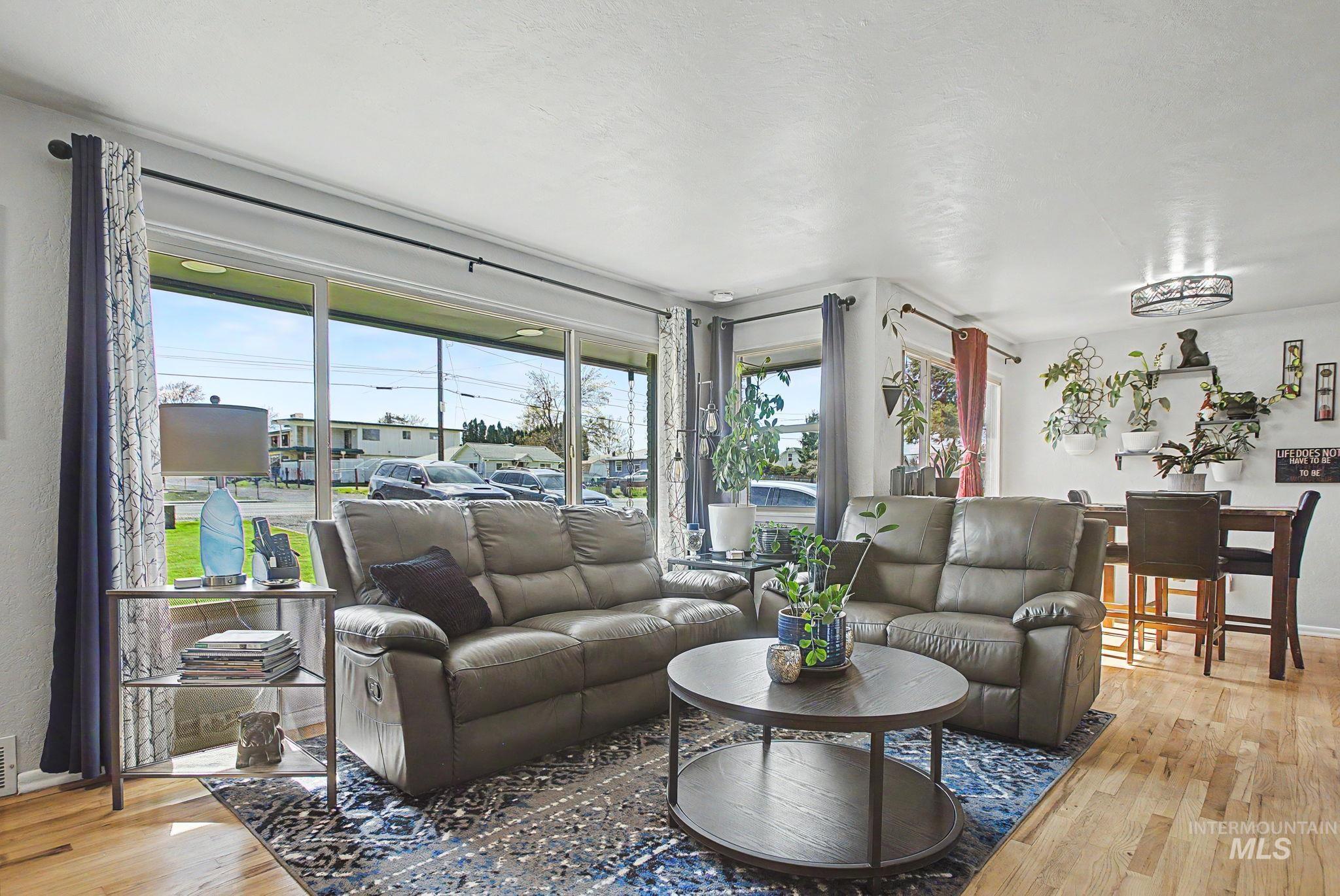809 Bryden Avenue Lewiston, ID 83501 - Photo 6 of 42 Living room with light wood finished floors and baseboards