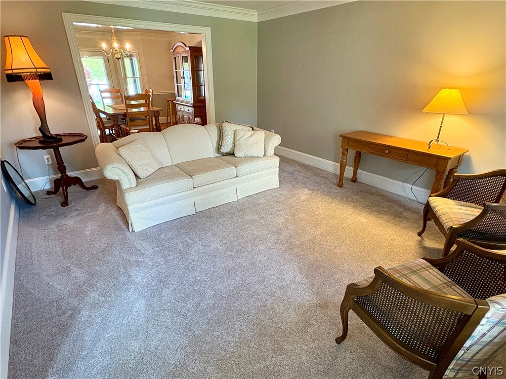 7892 East Ridge Pointe Drive Manlius, NY 13066 - Photo 7 of 46 Formal living room flows to the formal dining room.