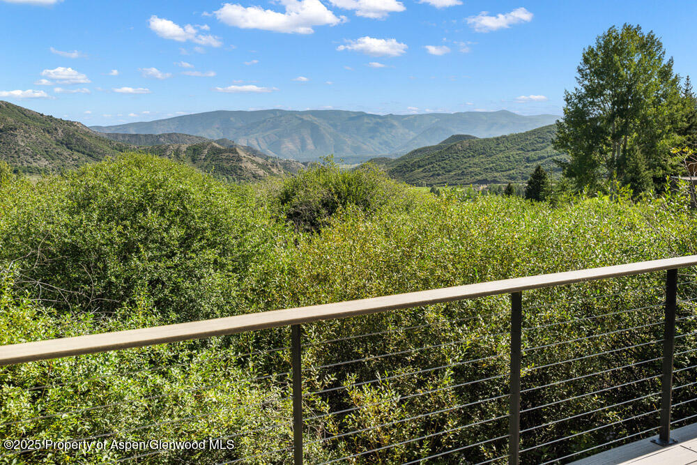 144 Meadow Road Snowmass Village, CO 81615 - Photo 24 of 25 a view of a balcony with an outdoor space