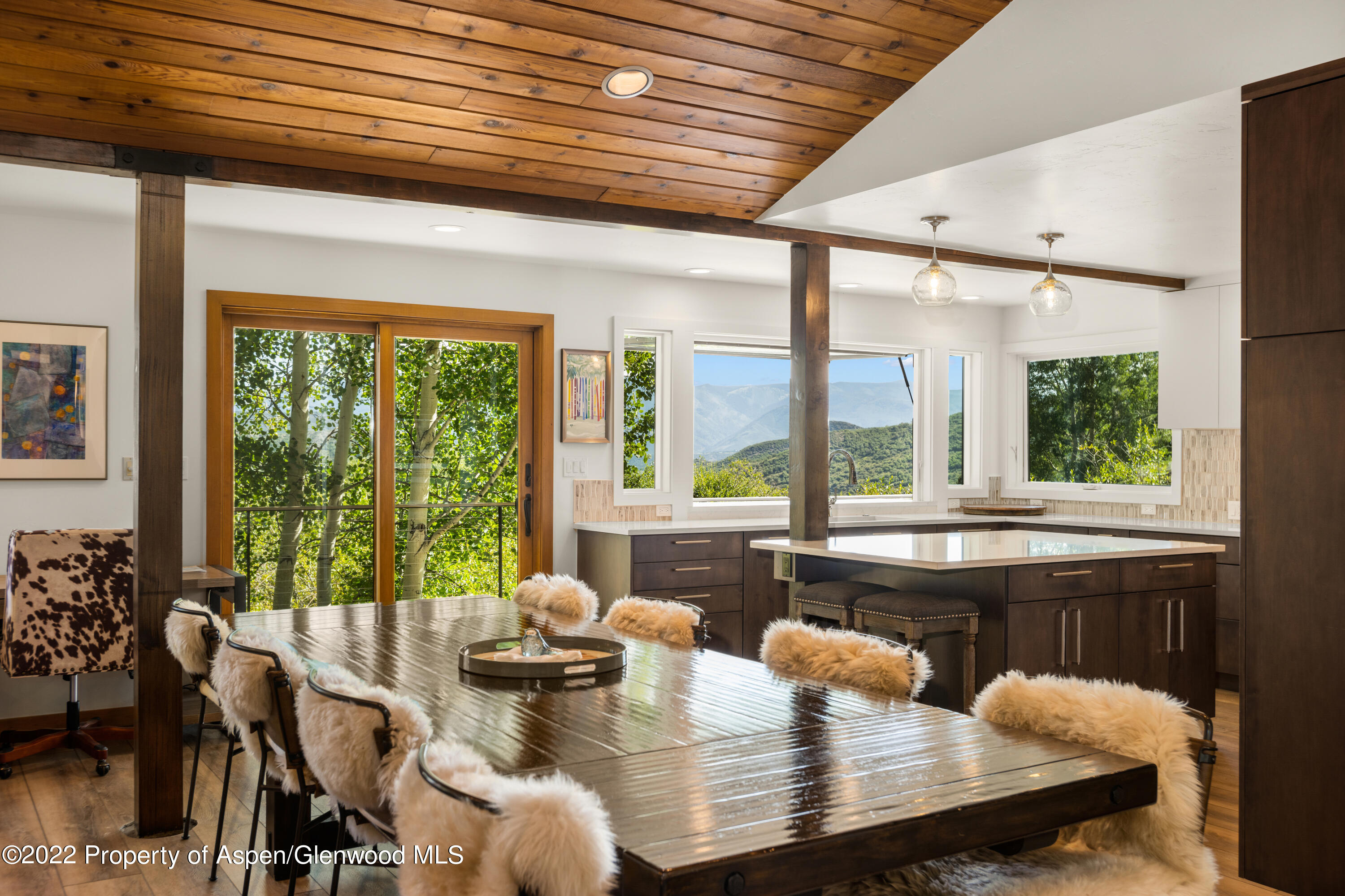 144 Meadow Road Snowmass Village, CO 81615 - Photo 7 of 25 a dining room with furniture window and outside view