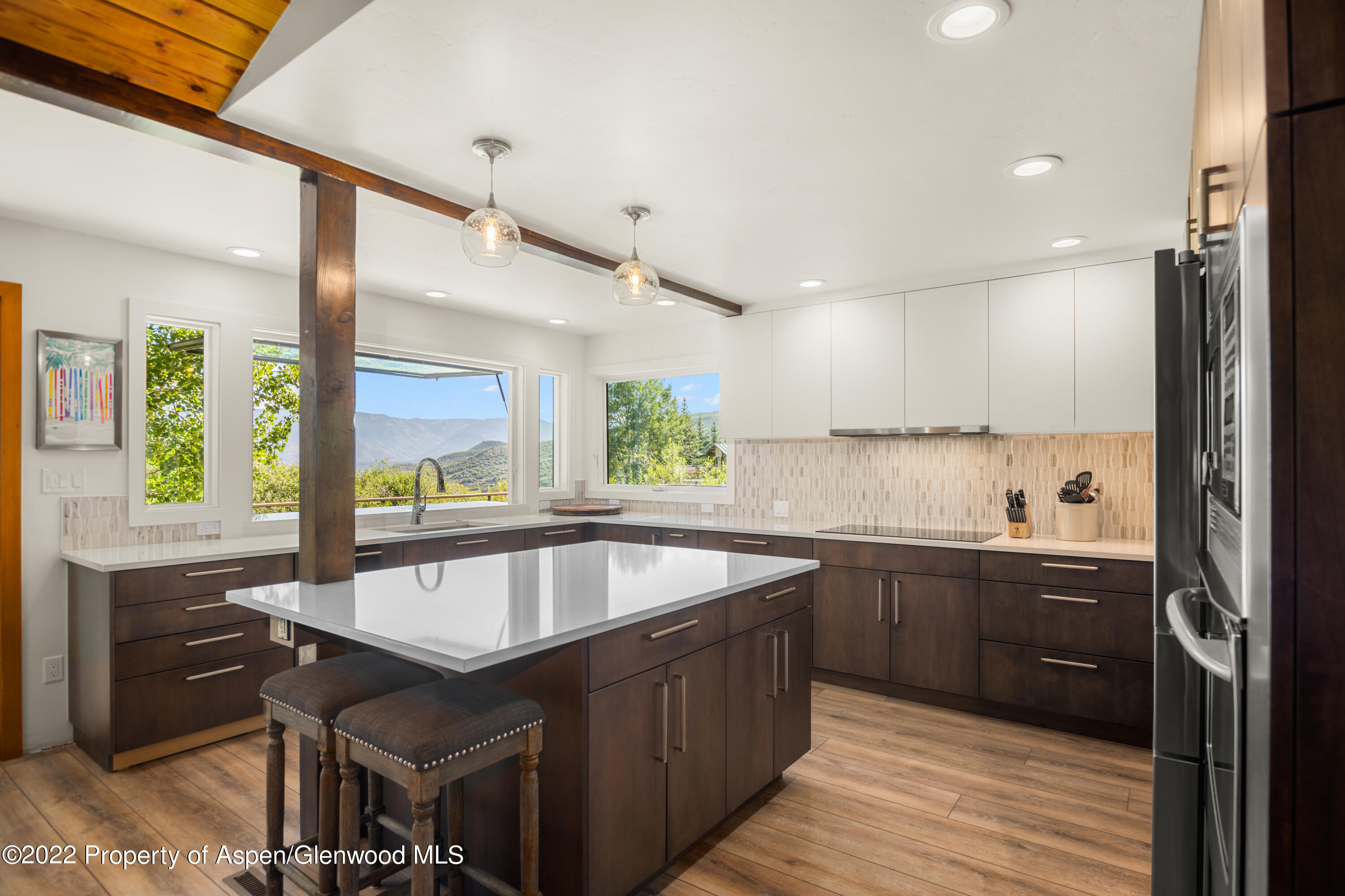 144 Meadow Road Snowmass Village, CO 81615 - Photo 8 of 25 a very nice looking kitchen with a large window