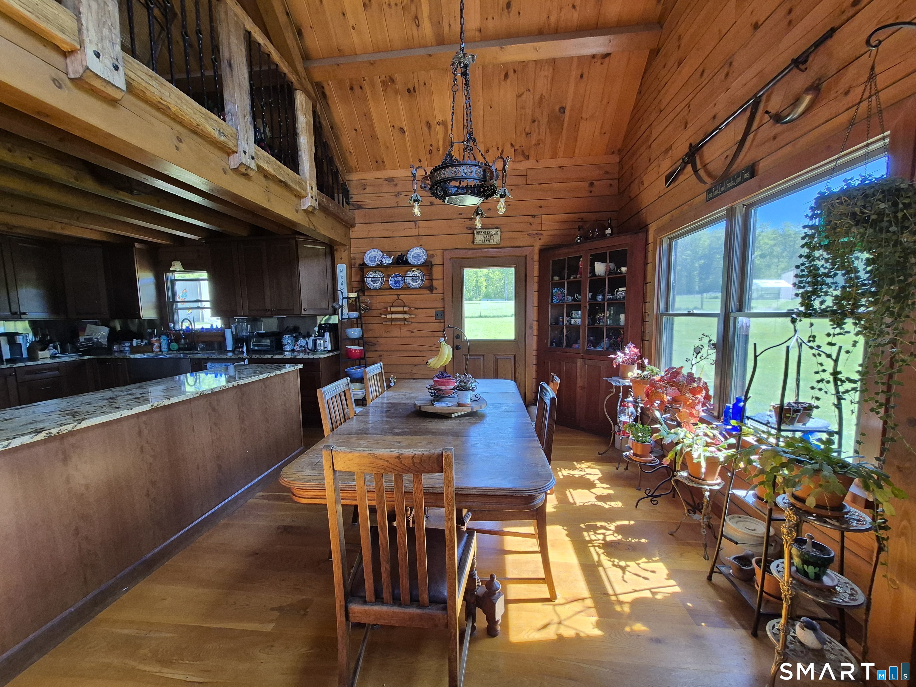 46 Cemetery Road Canterbury, CT 06331 - Photo 23 of 40 a view of a dining room with furniture one side kitchen view and a kitchen view