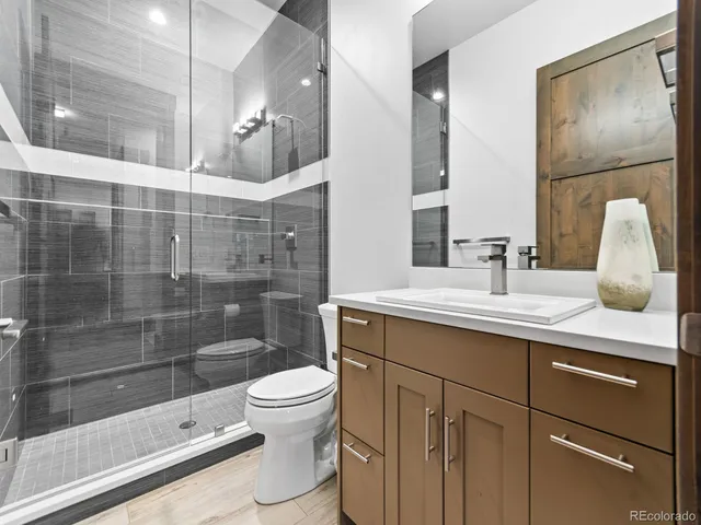 a utility room with sink dryer and washer