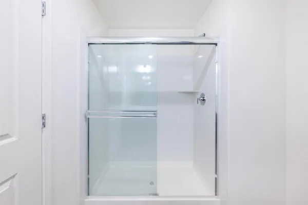 a kitchen with sink stove and refrigerator