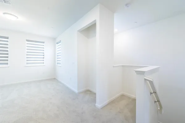 a front view of a house with parking space