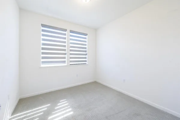 an aerial view of a city with lots of residential buildings