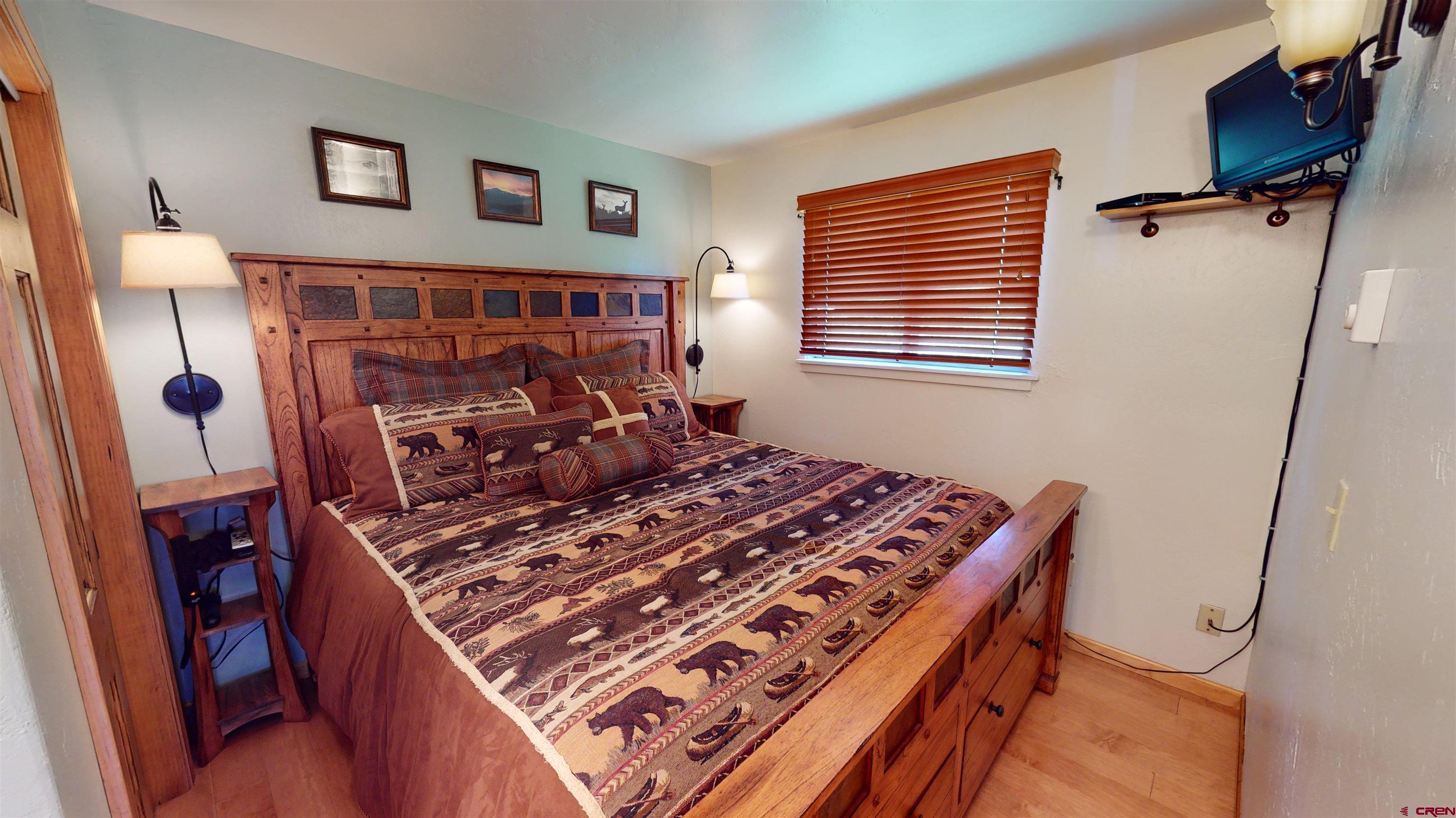 18 Crystal Road, Unit 3B Crested Butte, CO 81225 - Photo 13 of 20 a bed sitting in a bedroom next to a window