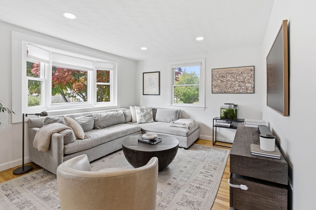 16 Beebe Lane Wakefield, MA 01880 - Photo 12 of 32 a living room with furniture and a large window