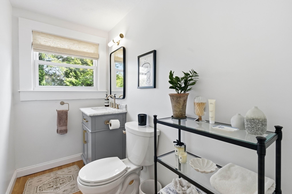 16 Beebe Lane Wakefield, MA 01880 - Photo 14 of 32 a bathroom with a toilet a sink and mirror