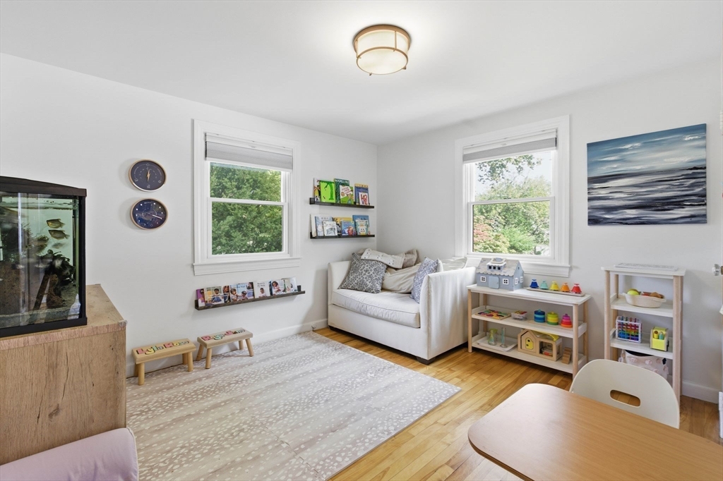 16 Beebe Lane Wakefield, MA 01880 - Photo 15 of 32 a living room with furniture and a large window