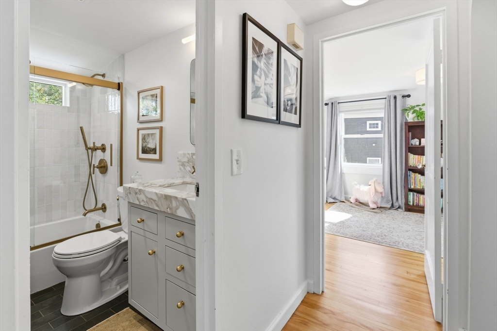 16 Beebe Lane Wakefield, MA 01880 - Photo 18 of 32 a bathroom with a granite countertop sink toilet and shower