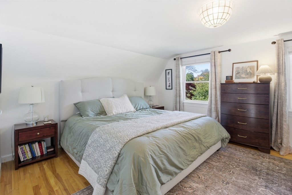 16 Beebe Lane Wakefield, MA 01880 - Photo 20 of 32 a bedroom with a bed and a window