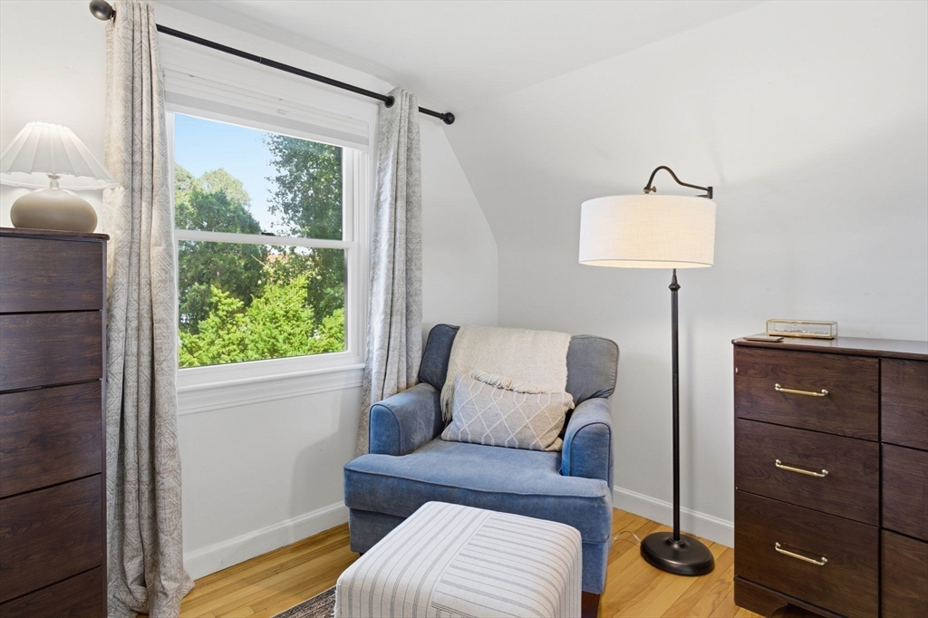 16 Beebe Lane Wakefield, MA 01880 - Photo 22 of 32 a living room with furniture and a window