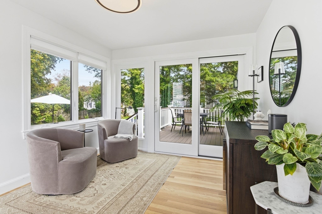 16 Beebe Lane Wakefield, MA 01880 - Photo 3 of 32 a living room with furniture a window and a potted plant