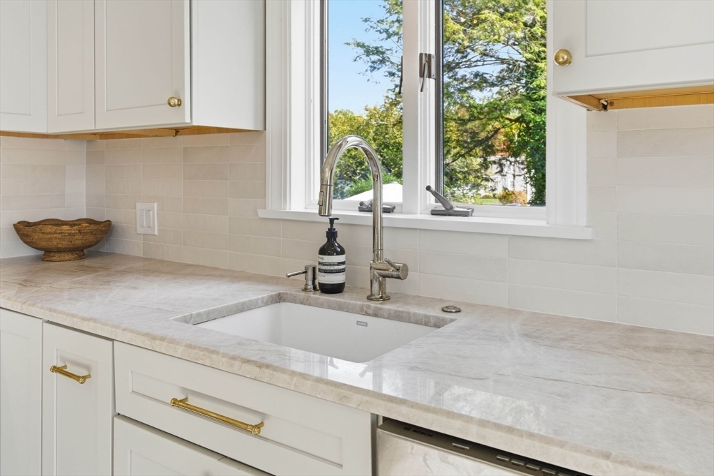 16 Beebe Lane Wakefield, MA 01880 - Photo 5 of 32 a kitchen with a sink and a window