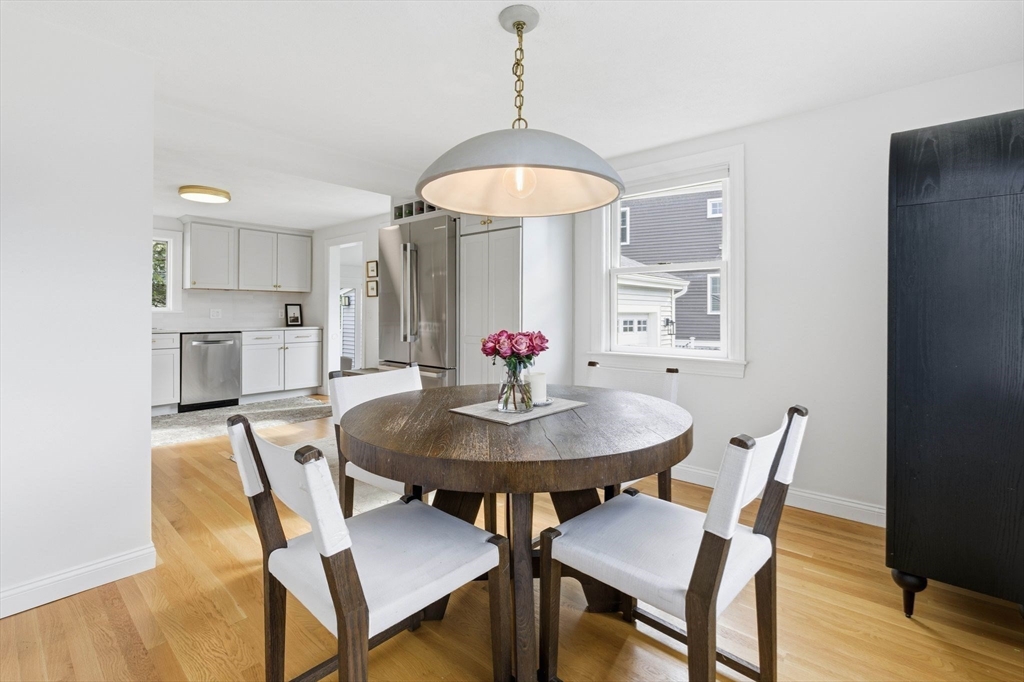 16 Beebe Lane Wakefield, MA 01880 - Photo 9 of 32 a view of a dining room with furniture and wooden floor