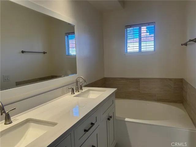 a bathroom with a sink and a bathtub