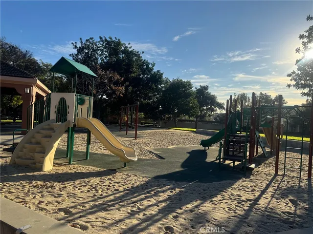 a view of a swimming pool with a lounge chair