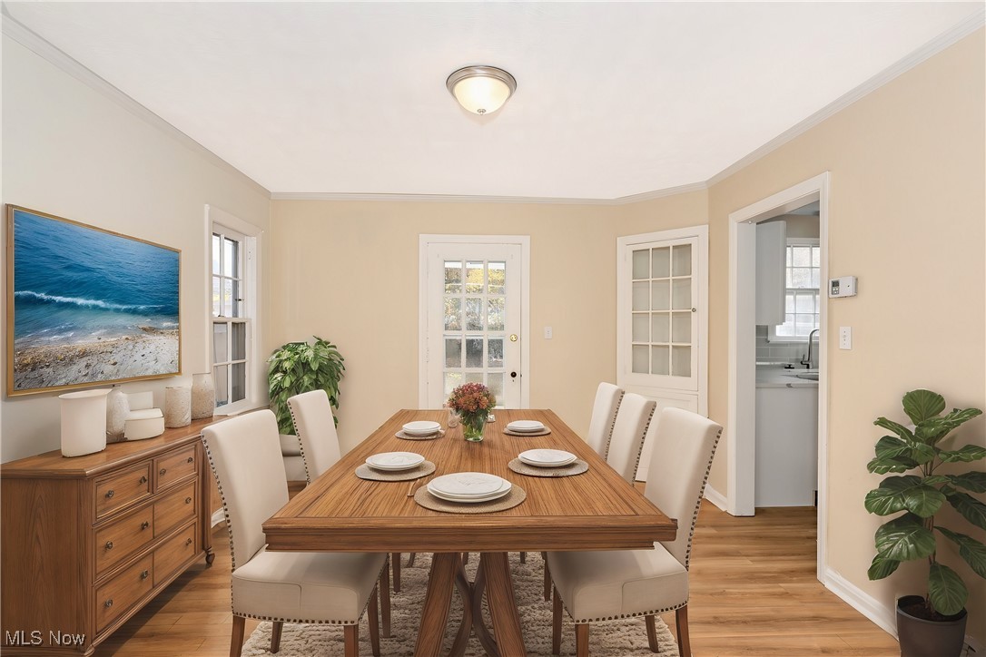 3938 Lansdale Road Cleveland, OH 44118 - Photo 10 of 34 Dining area with light hardwood / wood-style floors and plenty of natural light