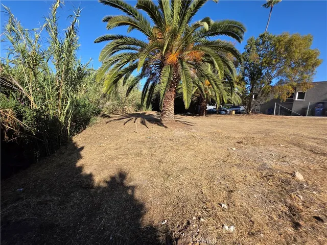 a view of a backyard of a house